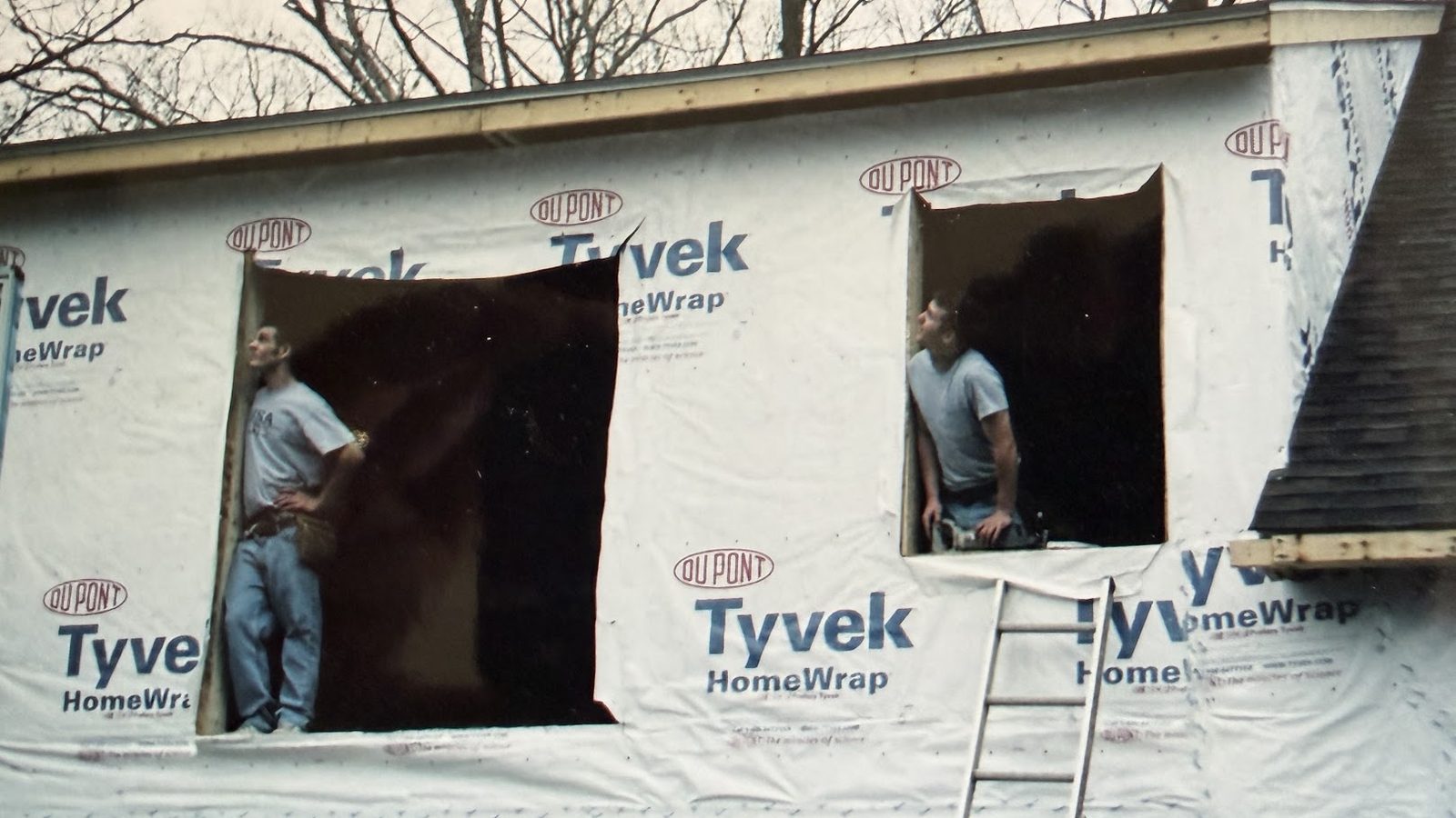 Jake and Sam Wadding framing window openings on an early job